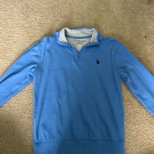 It’s a baby blue it’s a polo brand and a fitted skirt